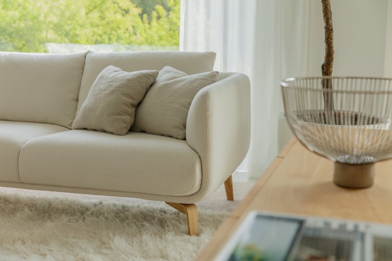 Table that sits store on couch